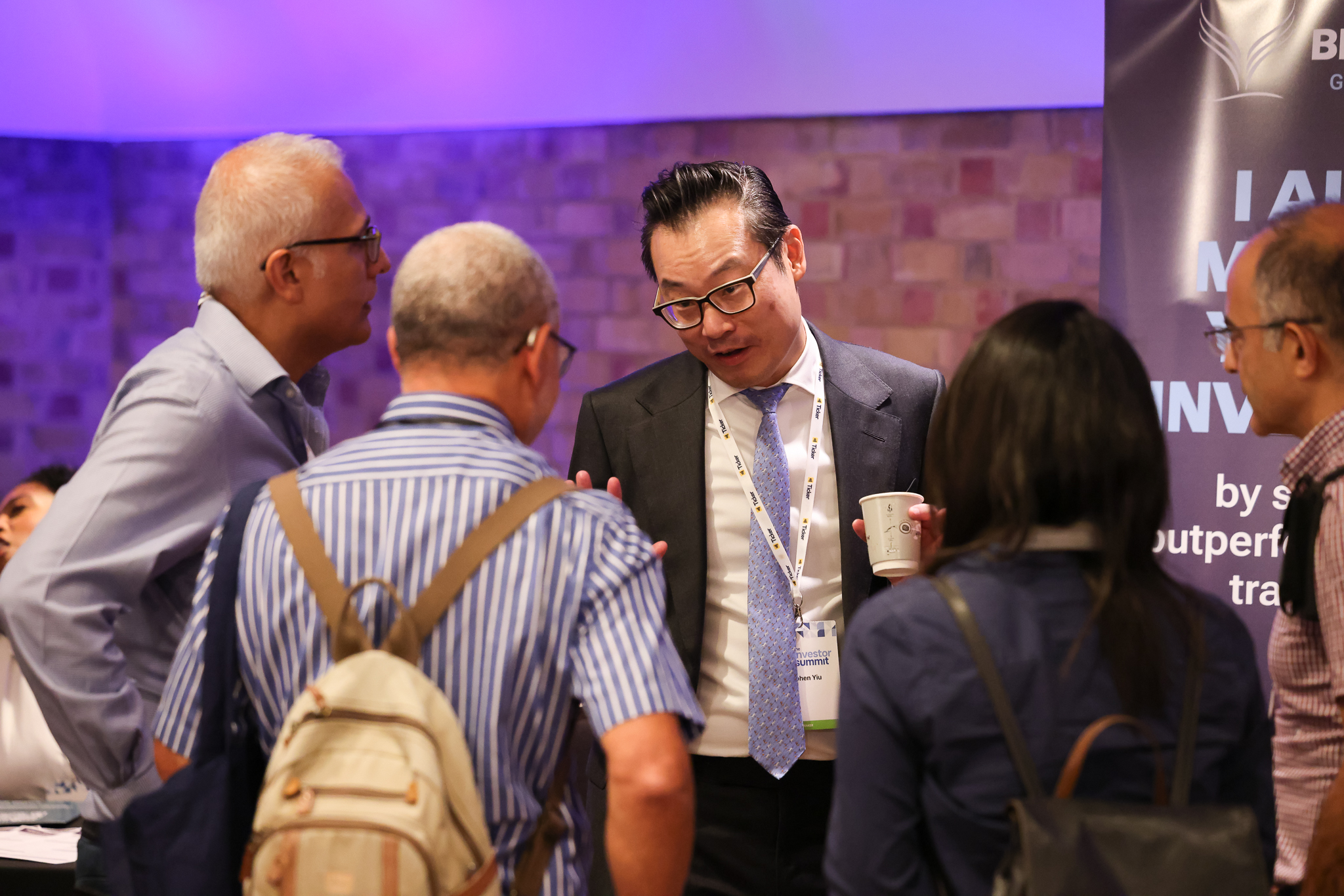 Delegates networking over coffee at Investor Summit