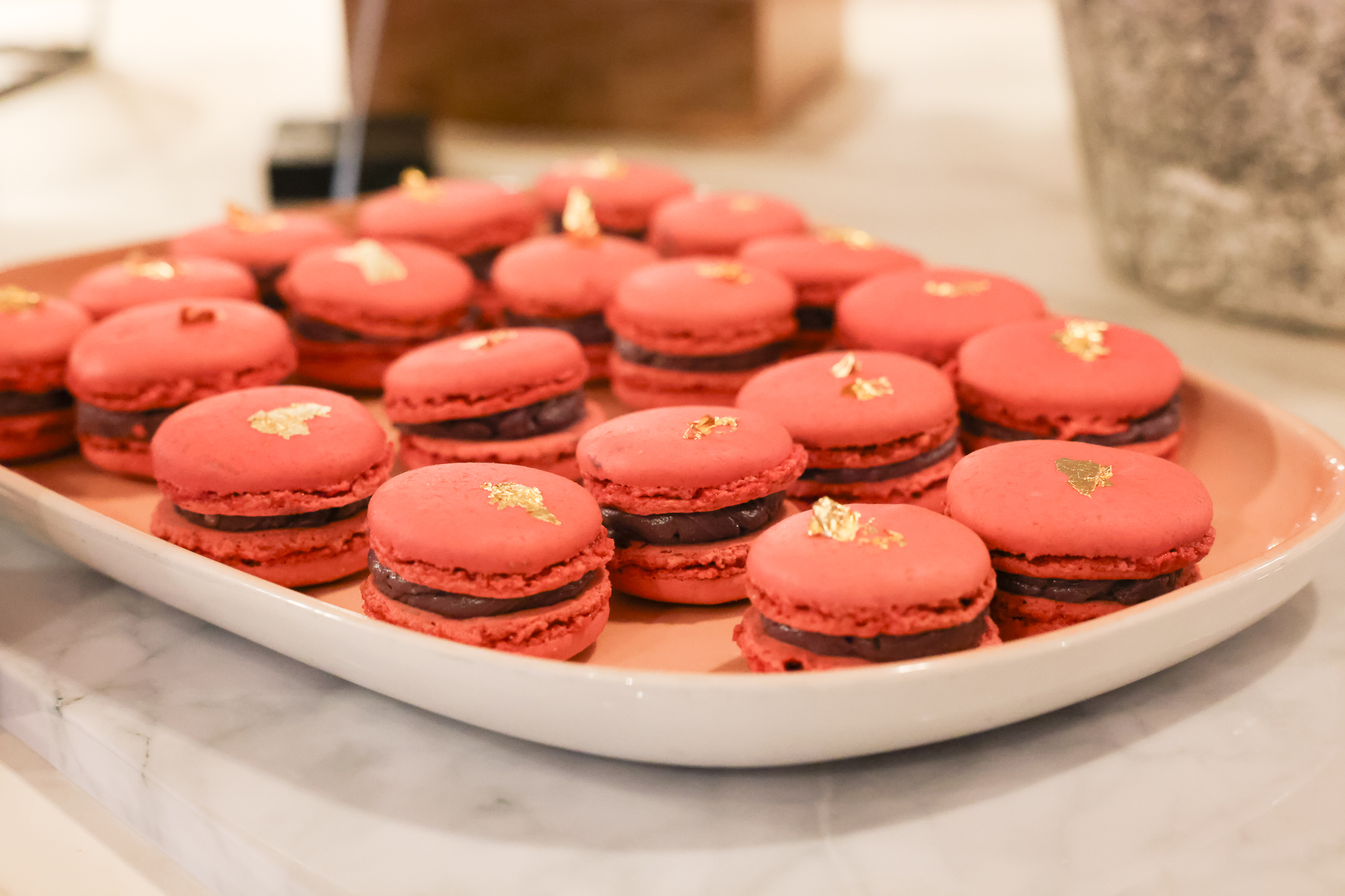 Gold leaf macarons served at Investor Summit